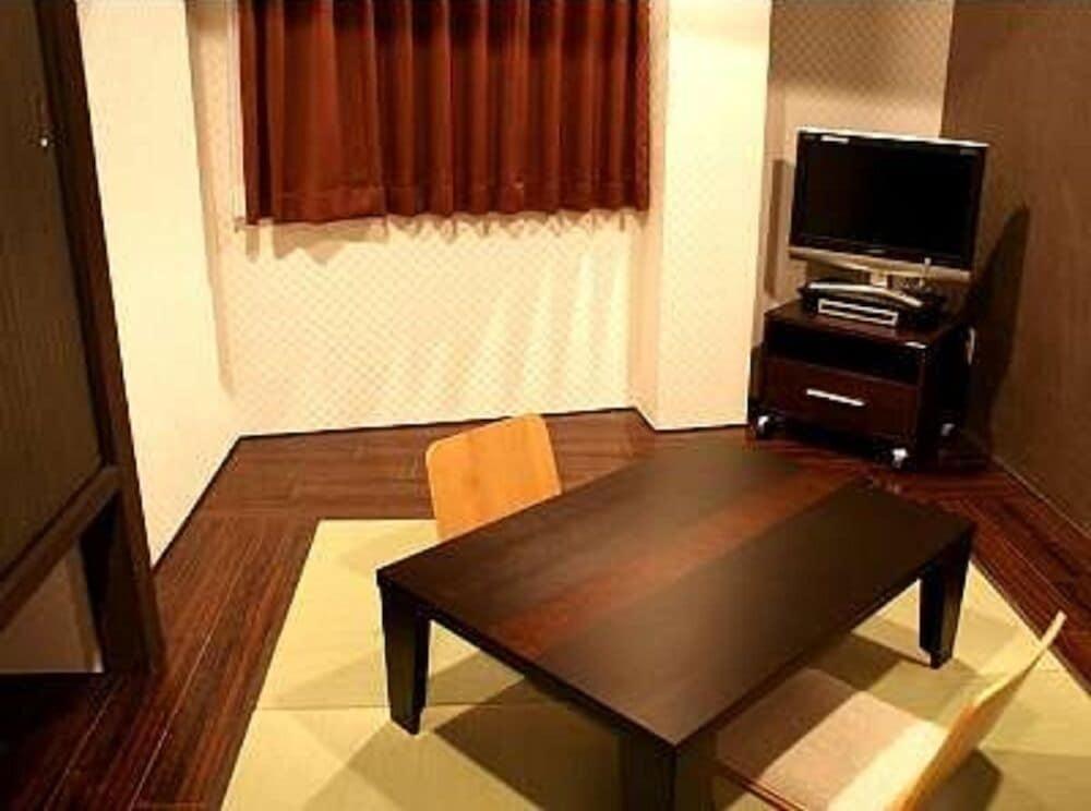 Hotel Livemax Budget Esaka Суйта Екстер'єр фото