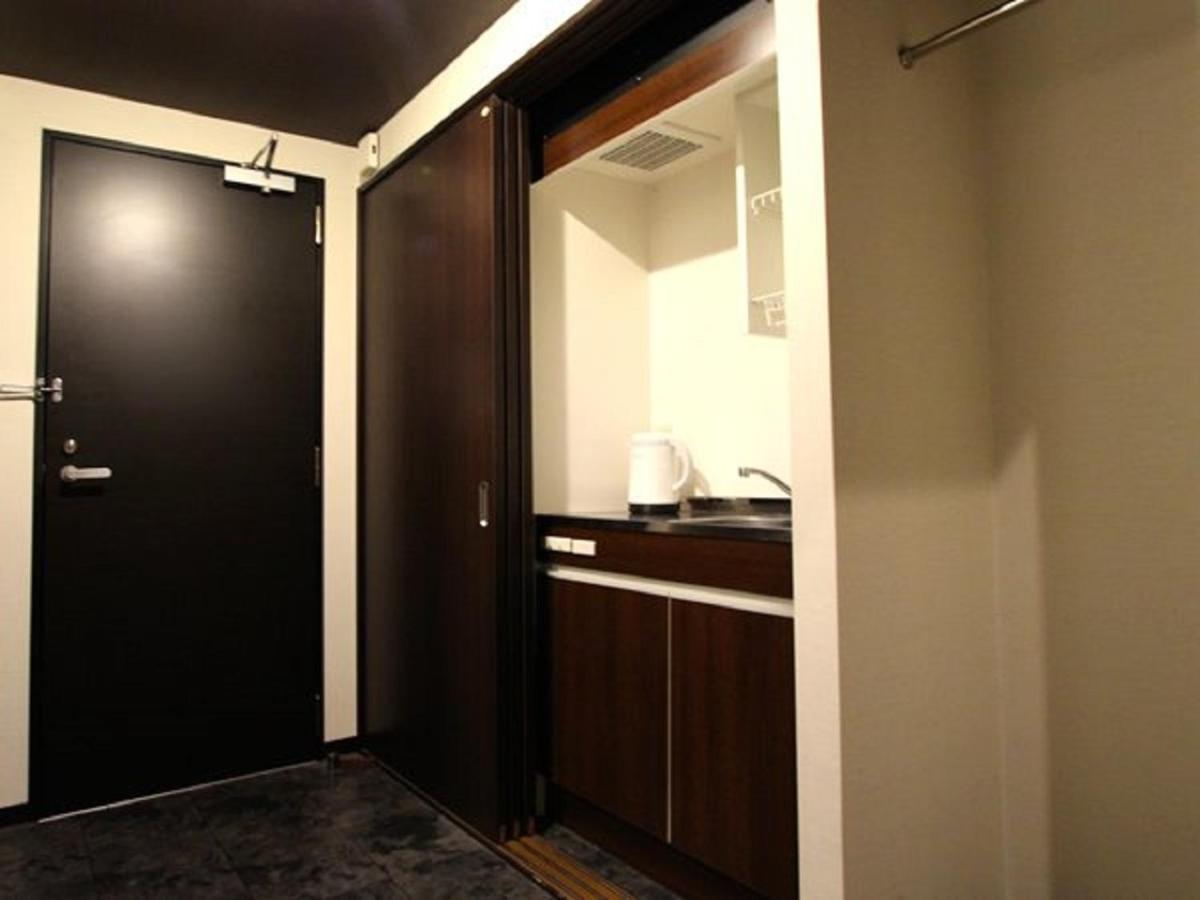 Hotel Livemax Budget Esaka Суйта Екстер'єр фото