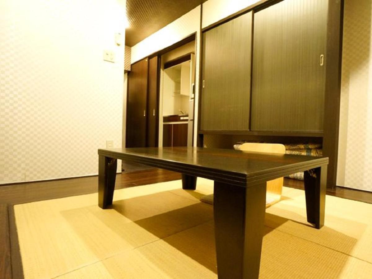 Hotel Livemax Budget Esaka Суйта Екстер'єр фото