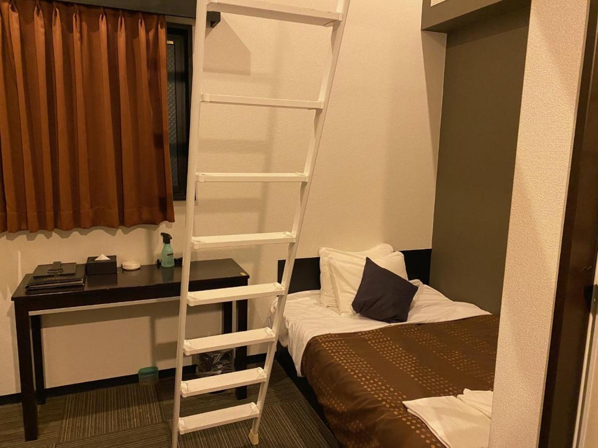 Hotel Livemax Budget Esaka Суйта Екстер'єр фото