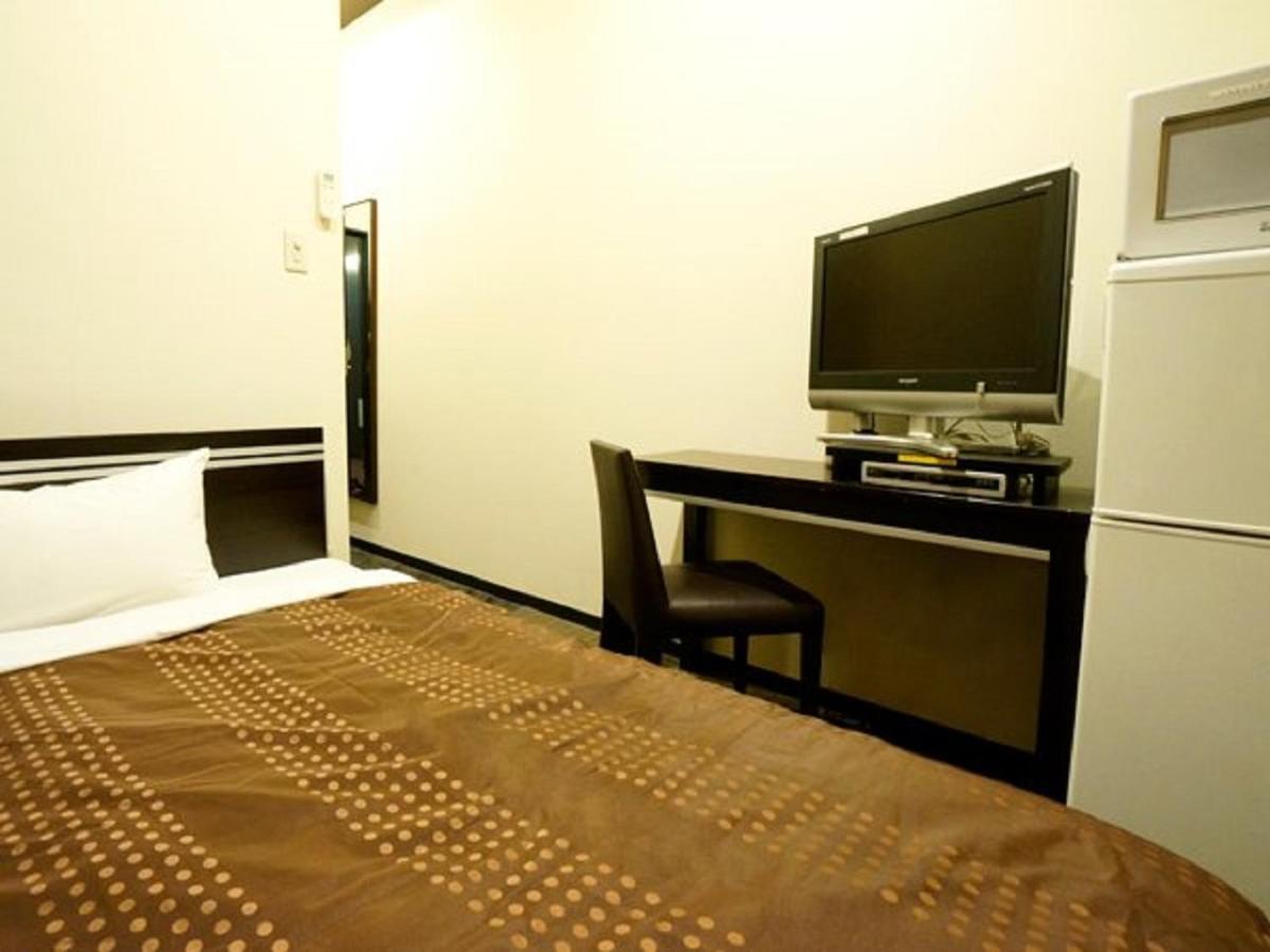 Hotel Livemax Budget Esaka Суйта Екстер'єр фото