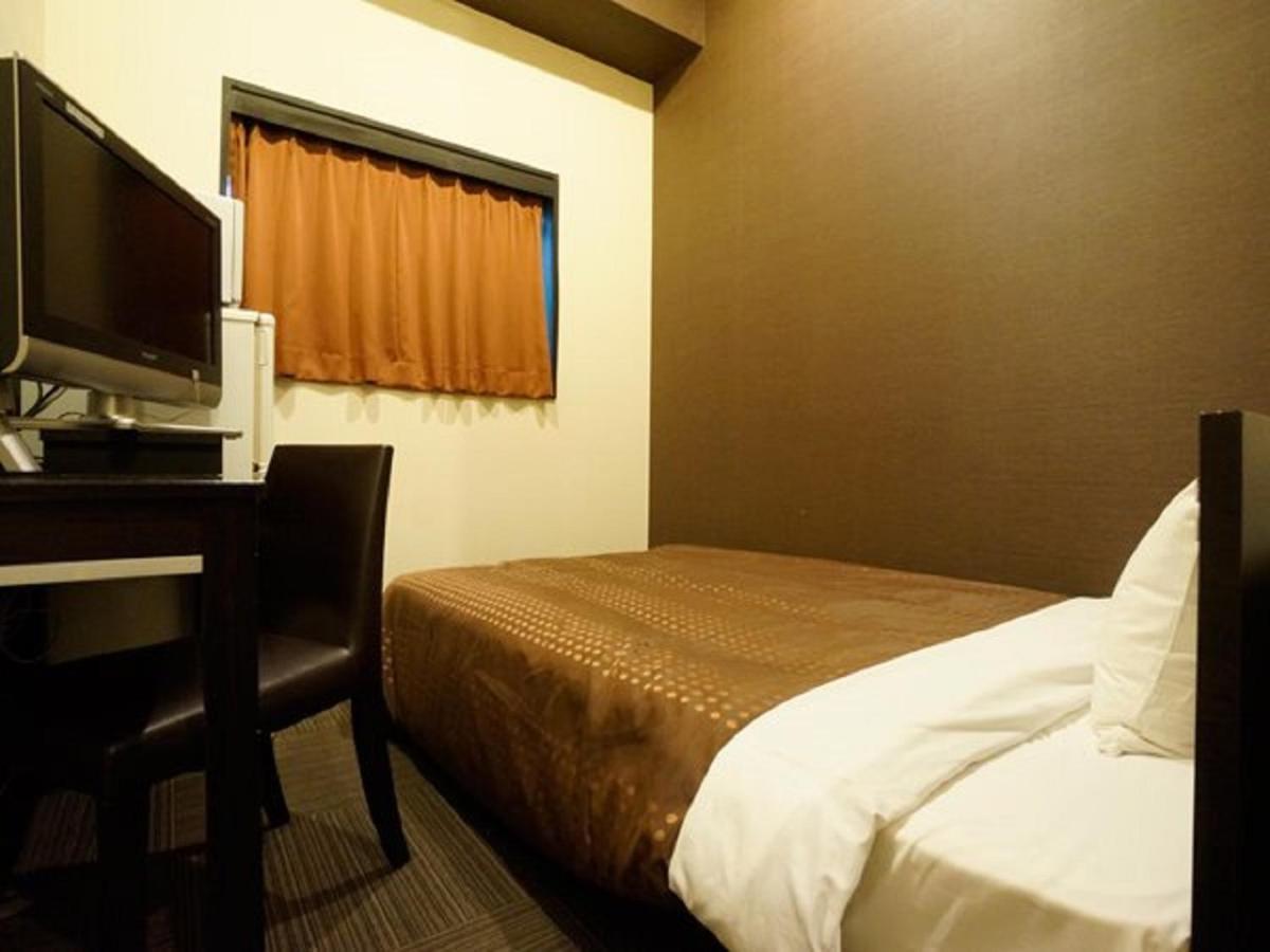 Hotel Livemax Budget Esaka Суйта Екстер'єр фото