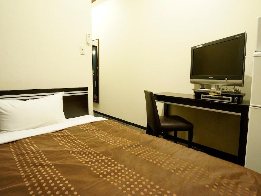 Hotel Livemax Budget Esaka Суйта Екстер'єр фото