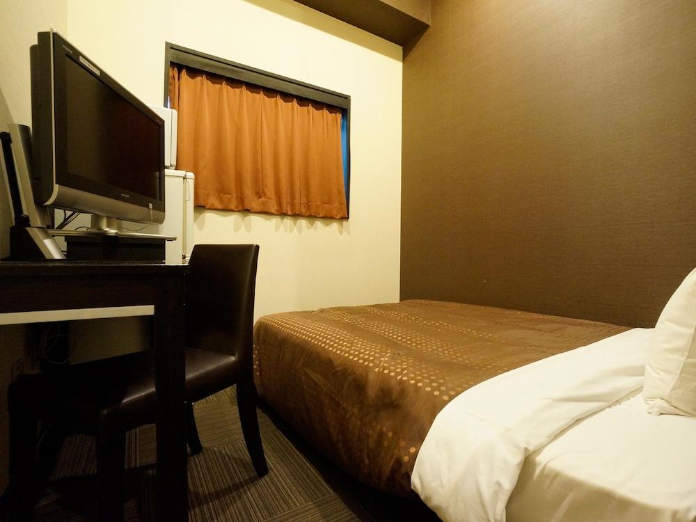 Hotel Livemax Budget Esaka Суйта Екстер'єр фото